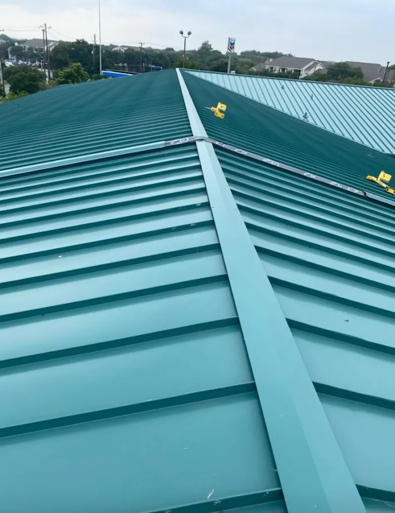 Green commercial metal roof ridge and valley for Metal Roof Repair in Boulder Creek